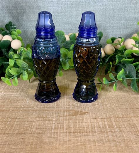 small metal salt and pepper shakers in blue box|blue glass salt and pepper.